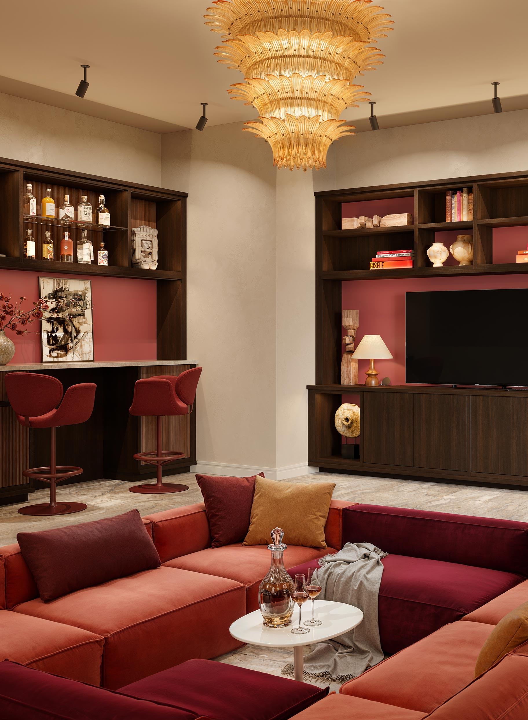 Sunk in living area with custom home bar and media center wall from California Closets