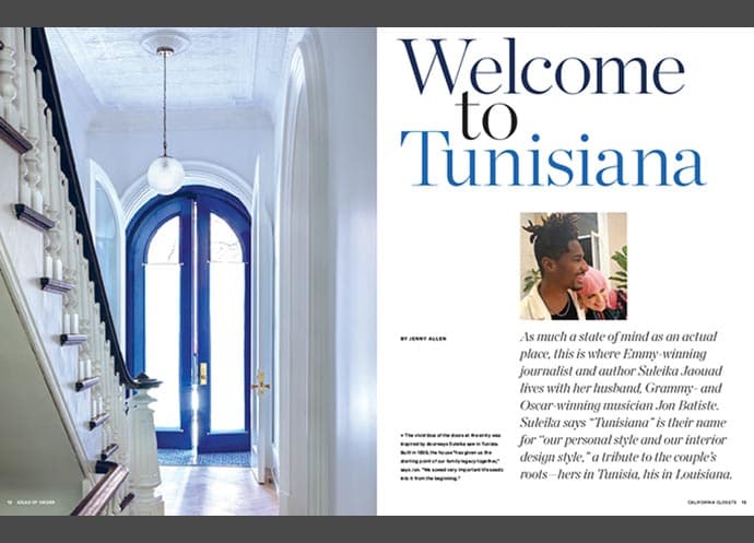 Magazine spread featuring a blue-doored hallway and article about Suleika Jaouad and Jon Batiste’s culturally inspired home design