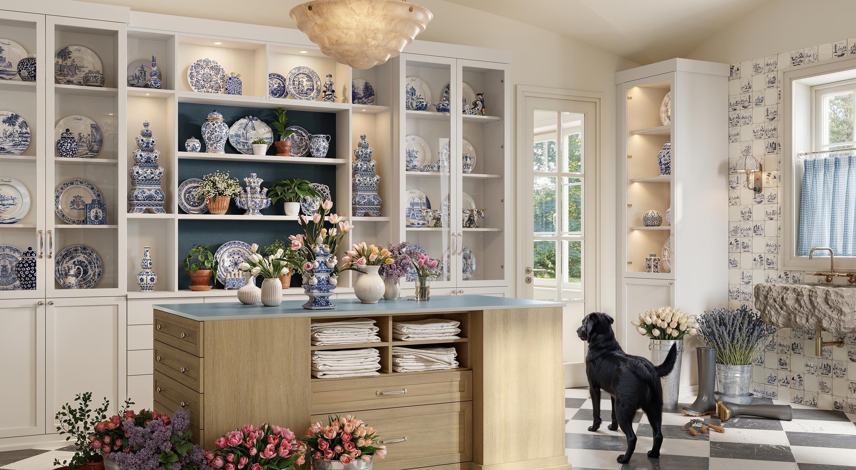 Elegant country kitchen design with custom shelving and center island storage by California Closets