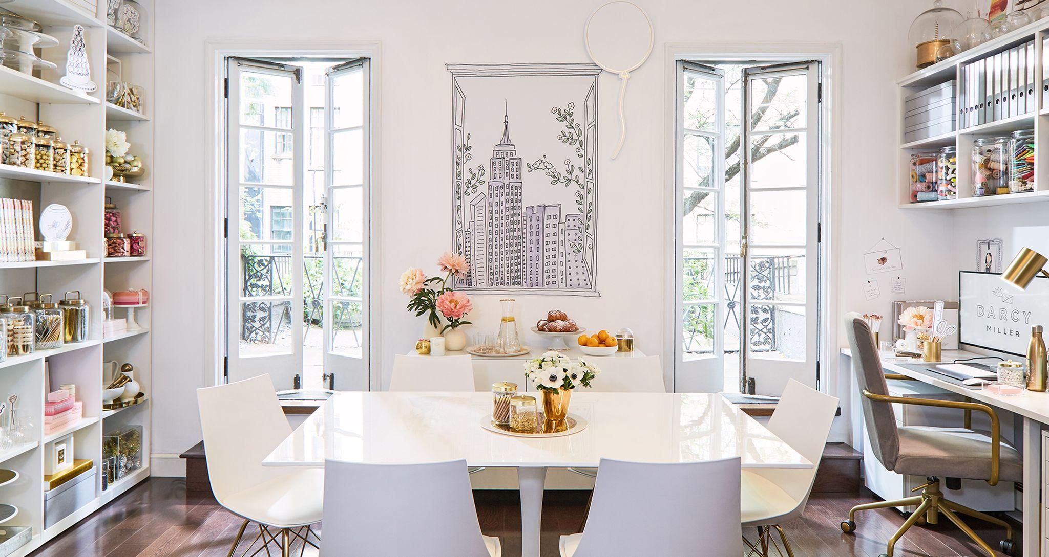 Darcy Miller's custom creative studio and office with shelving, desk and drawers by California Closets