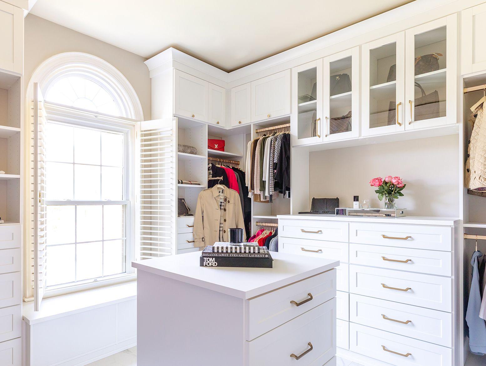 Walk in closet with dresser for undergarments and accessories by California Closets