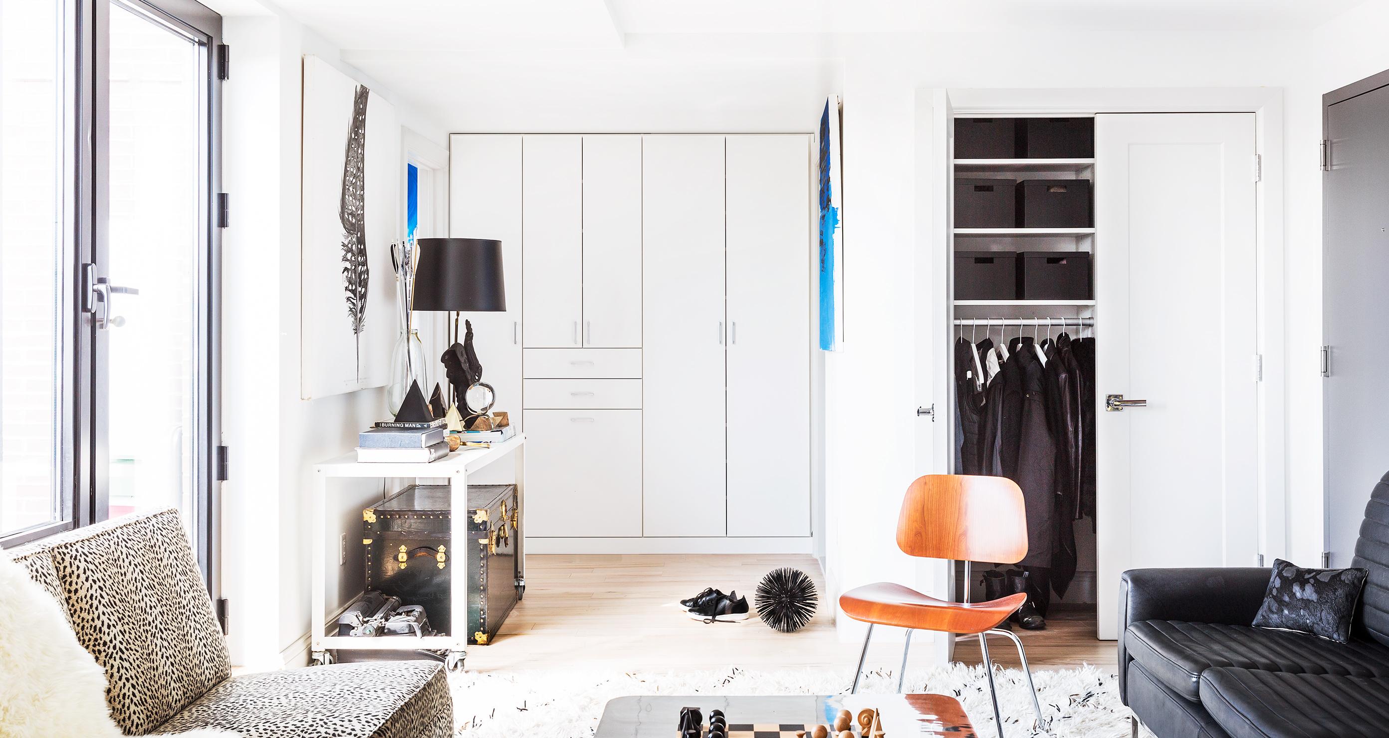 Erin Swift's open sitting and dressing room with custom reach in closet by California Closets