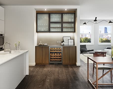 Custom entertainment center living room design ideas and walk in closet storage cabinets and shelving by California Closets