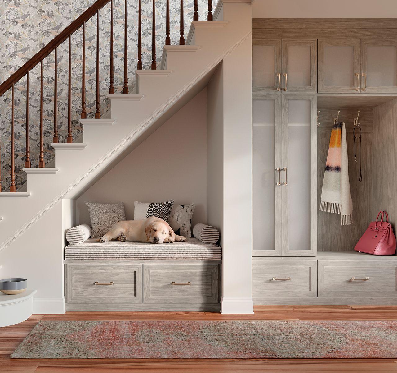 Customized storage cabinets, bench and closet for the home entryway designed by California Closets