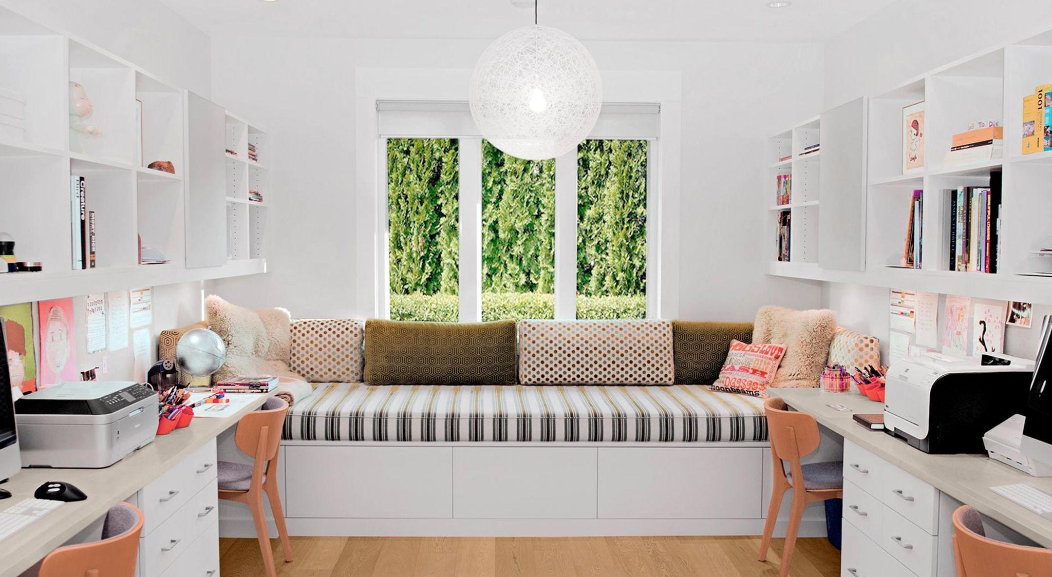 Built in workstations for a family home office with lots of storage by California Closets