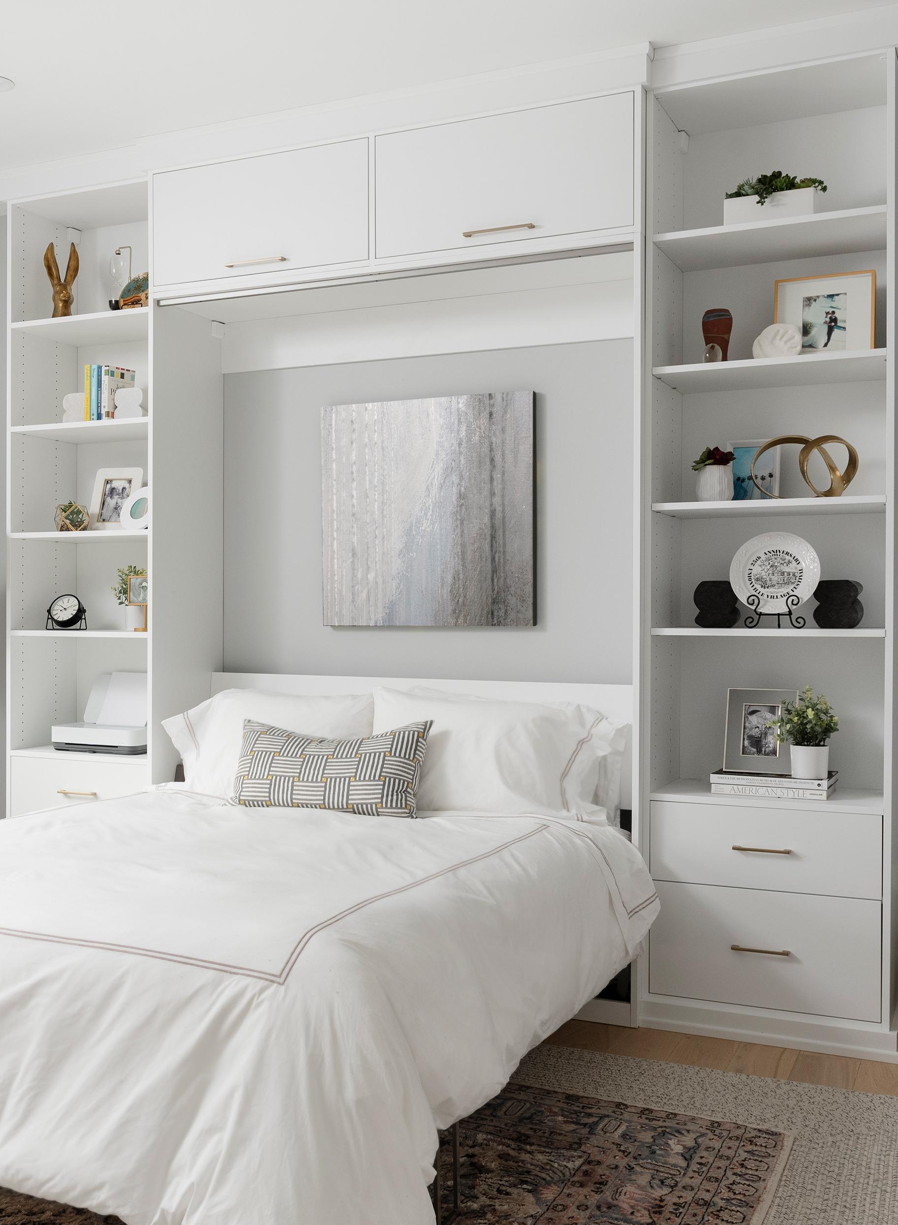 Bedroom with murphy bed custom made in a Dove matte finish California Closets