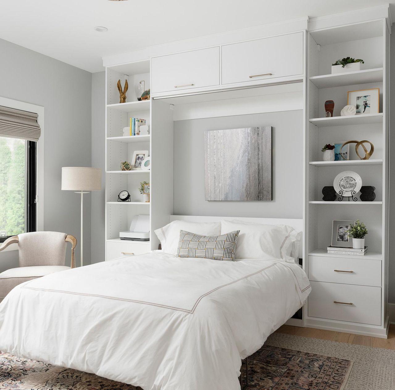 Tilt wall bed in white matte finish with open shelving and drawers by California Closets