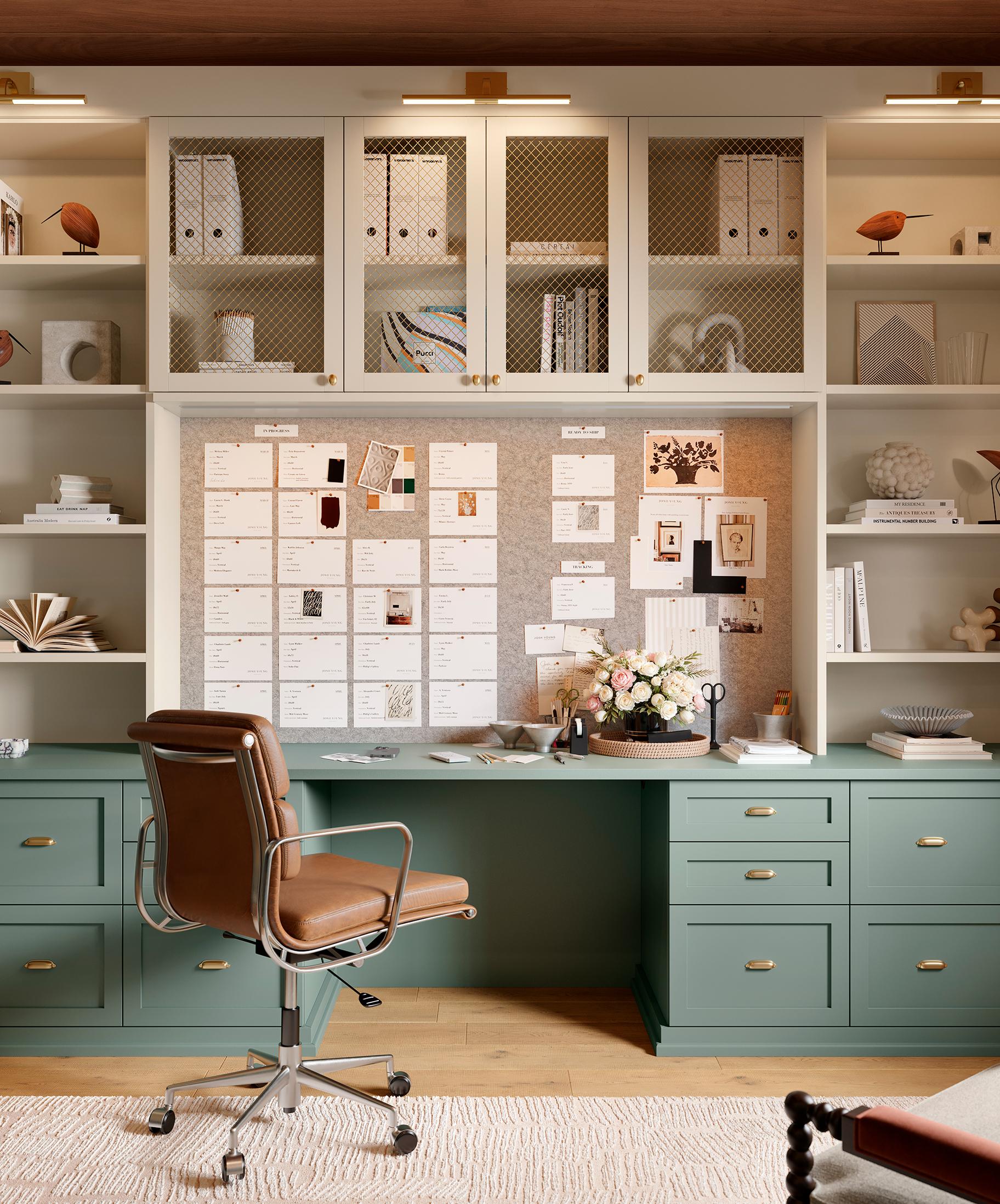 Sconce lighting design for home office with desk and shelves from California Closet