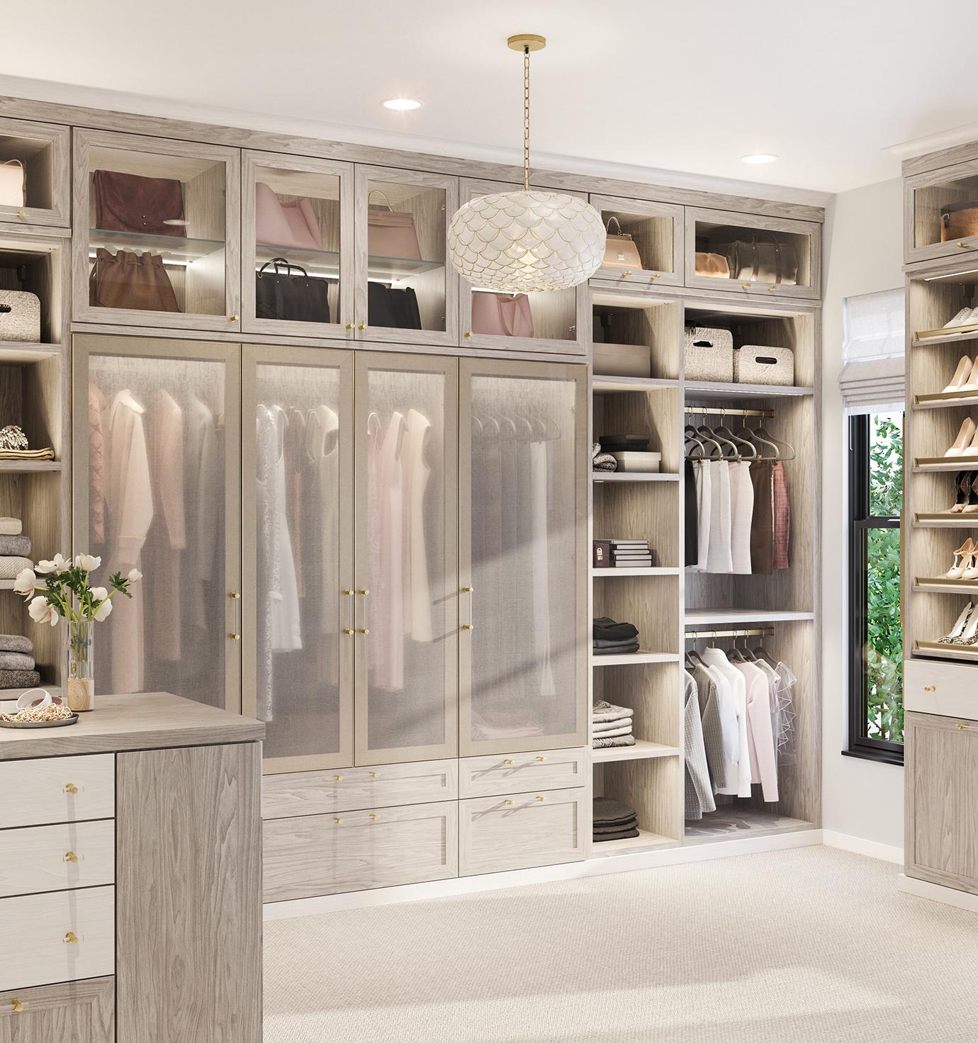 Children’s playroom built‑in featuring a full media wall, integrated bench drawers, and open display shelves in a matte gray finish by California Closets