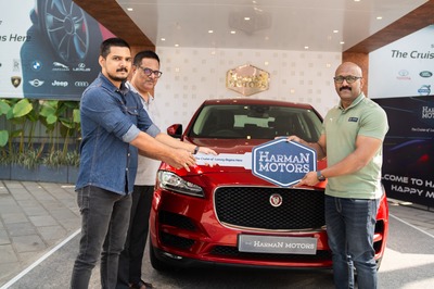 Mr Nithi Mark with their Jaguar