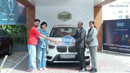 Mrs.BEENA with their BMW