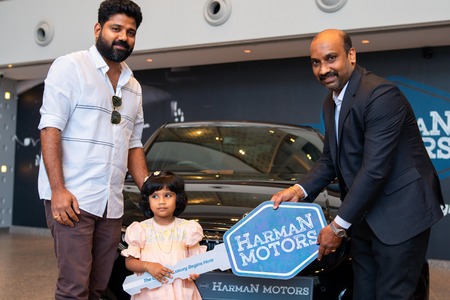 Mr.Anu George with their Land Rover / Range Rover