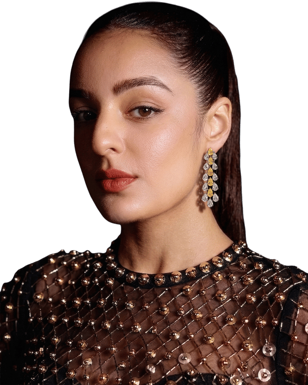 Carbon lab-grown diamond drop earrings worn with a beaded black gown