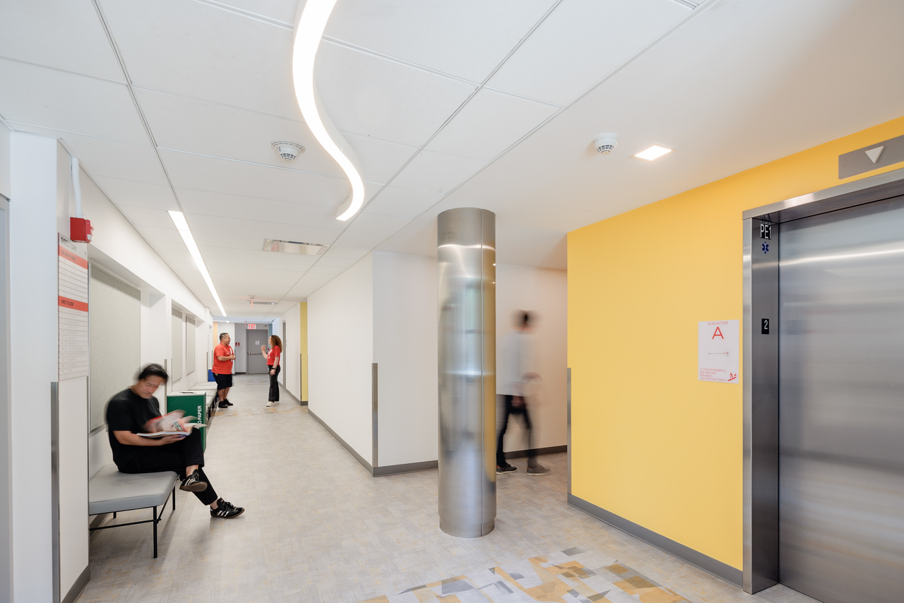 Upper floor with new elevator landing, art display areas and activity rooms