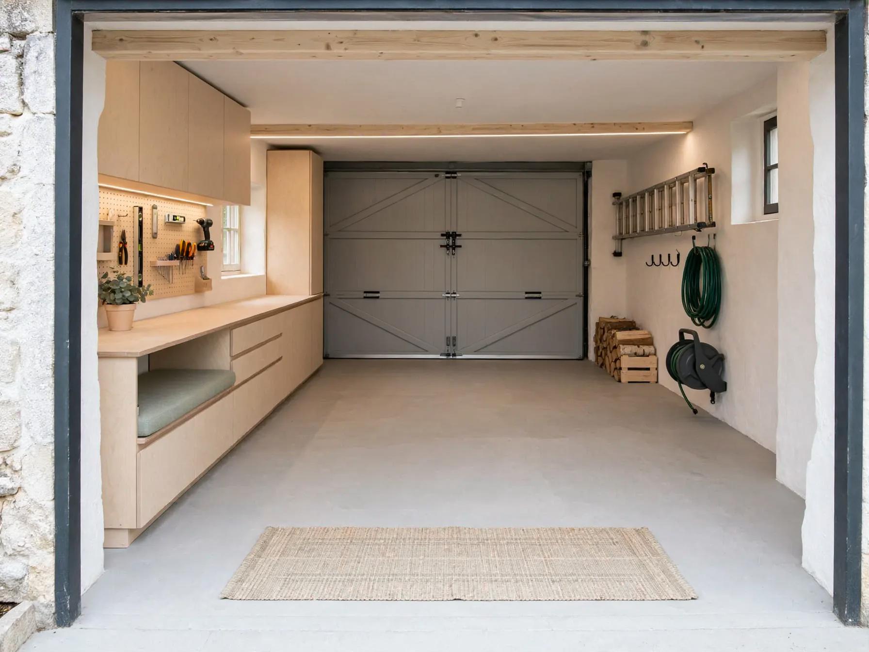 Scandinavian garage after AI restyle by Renovaitor: Light plywood workwall and built-in bench in rural garage