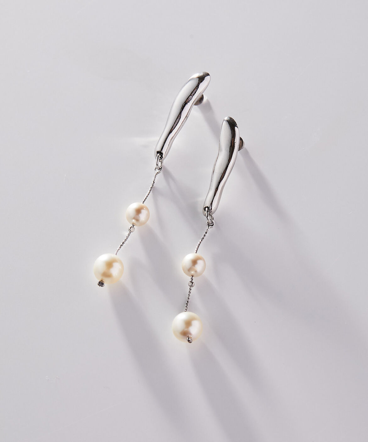 FRAGMENT arm double pearl pierce | ADER.bijoux