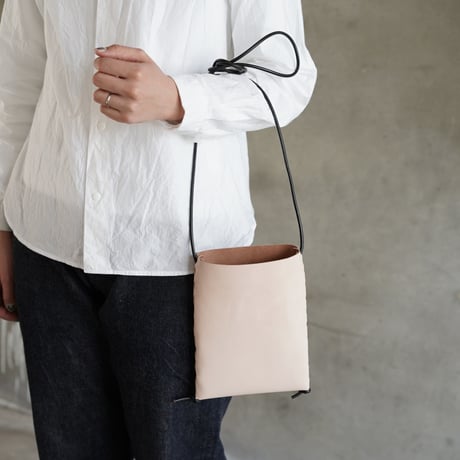 lille og stor / lomme (S) / black × black