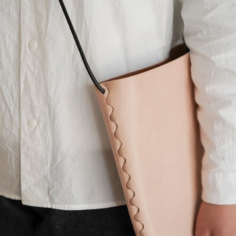 lille og stor / lomme (L) / black × natural
