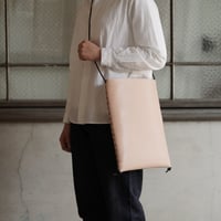 lille og stor / lomme (L) / black × natural