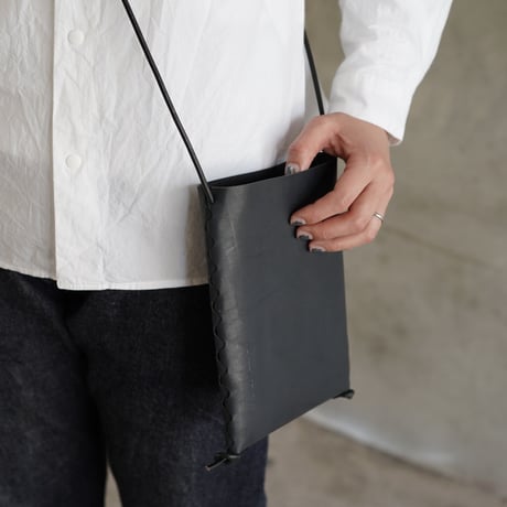 lille og stor / lomme (S) / black × black