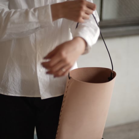 lille og stor / lomme (L) / black × natural