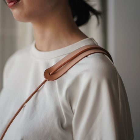 lille og stor / lomme (L) / black × natural