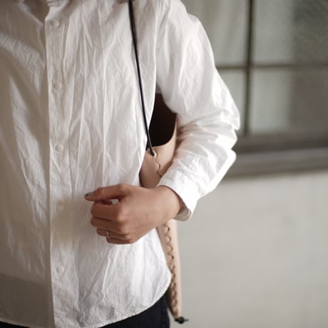 lille og stor / lomme (L) / black × natural
