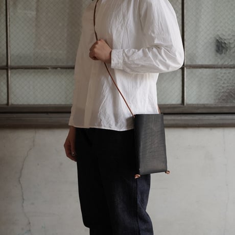 lille og stor / lomme (S) / natural × black