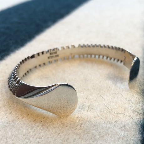 "Isaiah Ortiz" (sun felipe)” hand cut triangle bangle