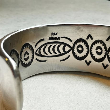 indian jewelry "Ray Adakai (navajo)” 1inc w-stamp wide bangle