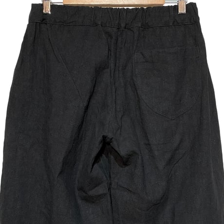 COLINA CAPERTICA "ramie×cotton canvas / peg top easy pants"(burned black) unisex