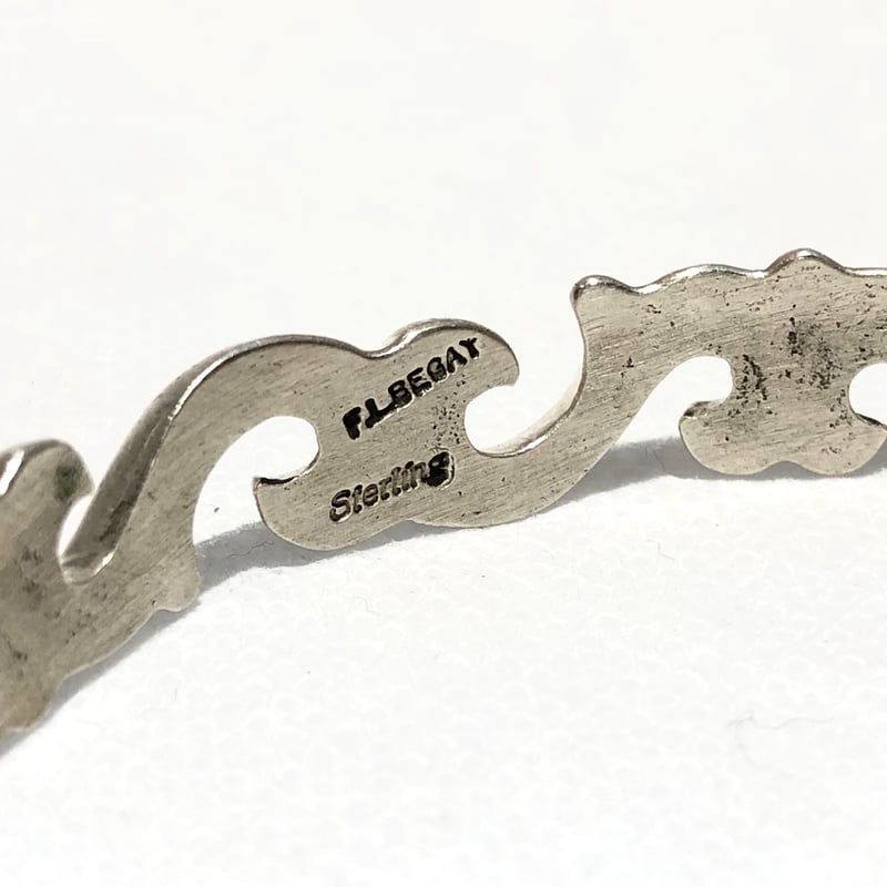 indian jewelry “F.L Begay(navajo)”sandcast bang