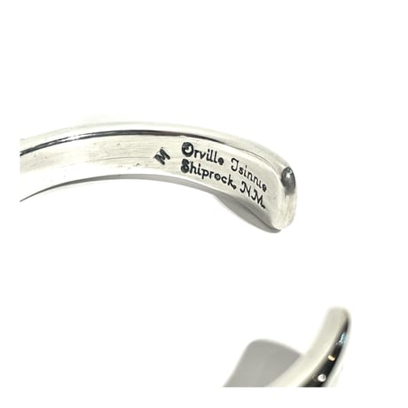 indian jewelry "Orville Tsinnie (navajo)” stamped round bangle