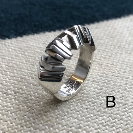 "Isaiah Ortiz" (sun felipe)” hand cut triangle ring