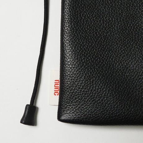 nunc  "Current- Water repellent leather ”