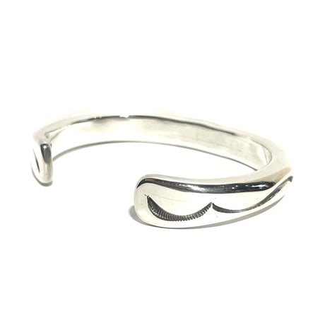 indian jewelry "Orville Tsinnie (navajo)” stamped round bangle