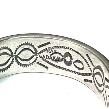 indian jewelry "Ray Adakai (navajo)” 1/2inc w-stamp bangle
