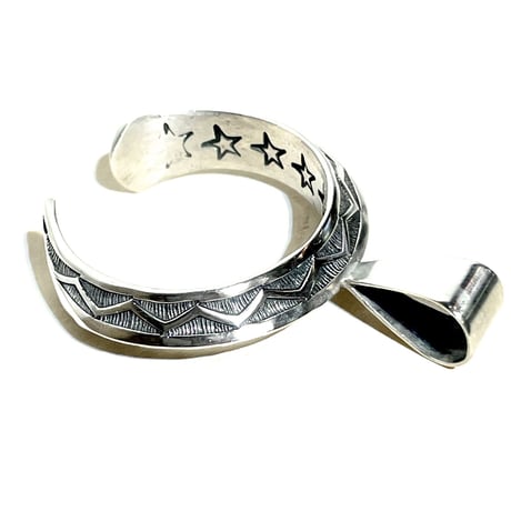 indian jewelry"Sunshine Reeves (navajo)"Naja triangle stamp work top