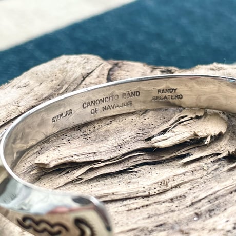 indian jewelry "Randy Secatero (navajo)” stamped triangle bangle