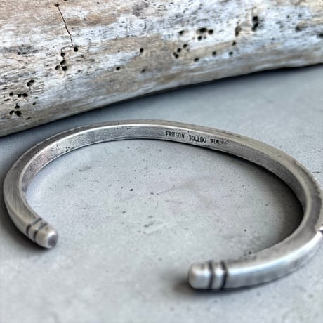 indian jewelry "Flitson Toledo(navajo)”vintage style stamped narrow bangle