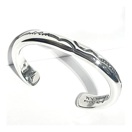 indian jewelry "Orville Tsinnie (navajo)” stamped round bangle
