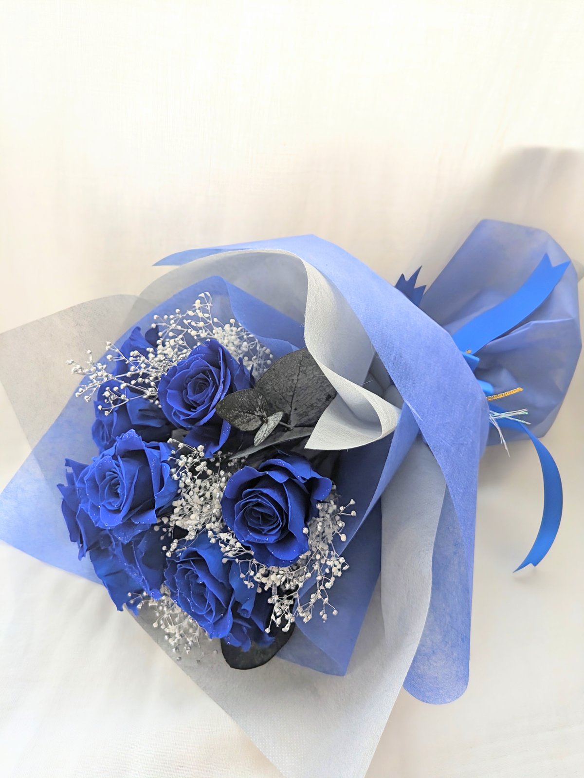プリザーブドフラワー青い薔薇11本とかすみ草の花束／奇跡．神の祝福