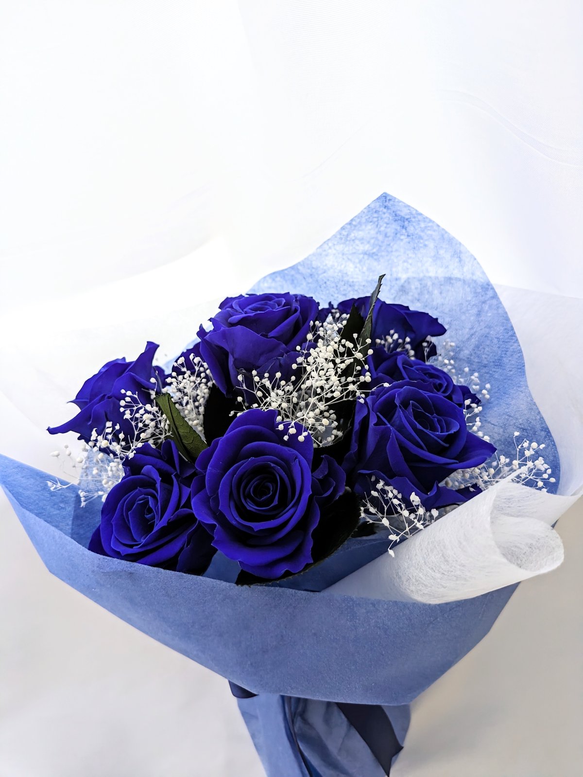プリザーブドフラワー青い薔薇9輪とかすみ草の花束 | 世都華