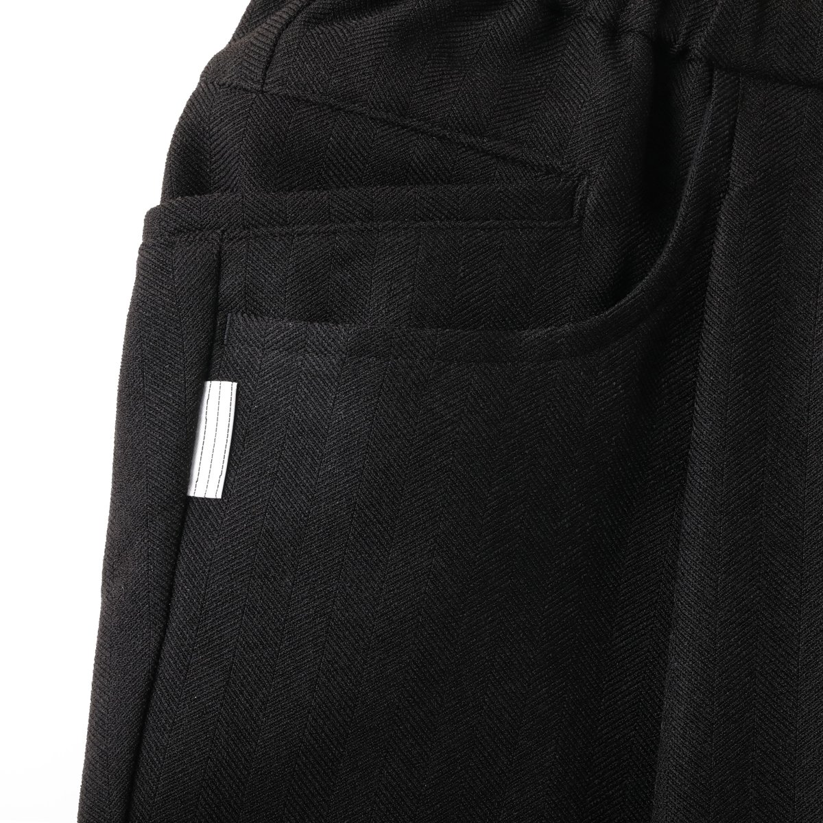 S.F.C WIDE TAPERED EASY PANTS (WOOLHERRINGBONE)...