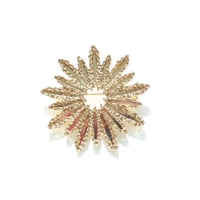 Gold flower brooch