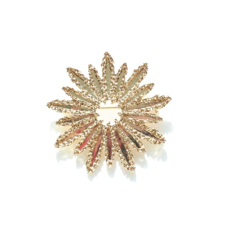 Gold flower brooch