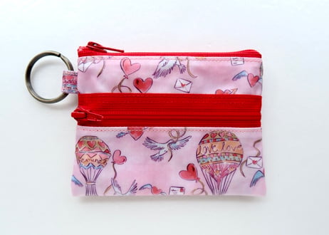 トコトコウォレット(M)・＜リング上＞ラブインジエアー・ピンク（リバティプリント・ラミネート）