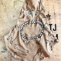 On military OMA overdrawing personal shelter  Two eyes deep in one hole.