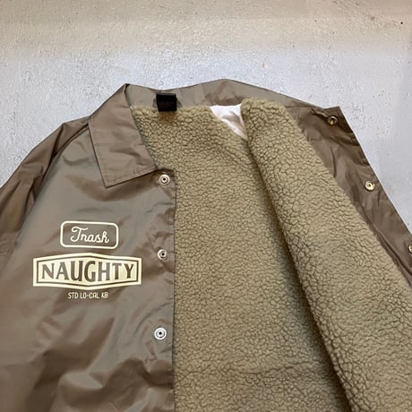 WE'RE NAUGHTY COACH JACKET(KHA)
