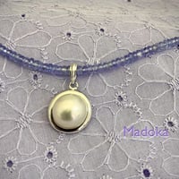 Madoka（円）